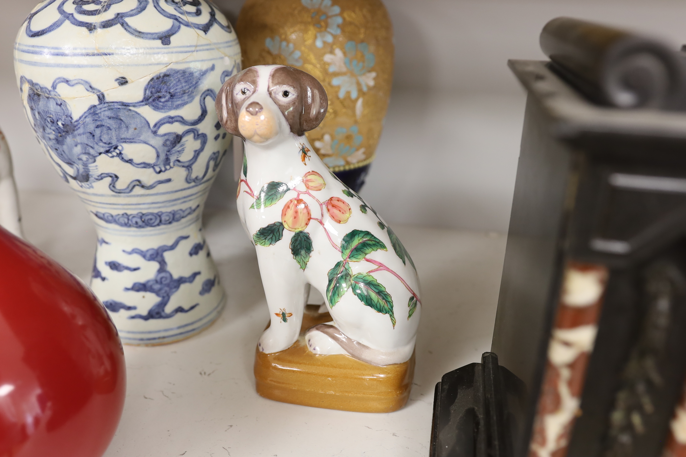 A Chinese blue and white Meiping, a copper red glaze vase and a pair of dog figures, tallest 30cm